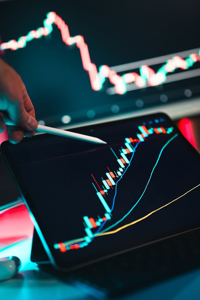 Home Close-up of cryptocurrency trading analysis on a digital tablet, highlighting market trends.