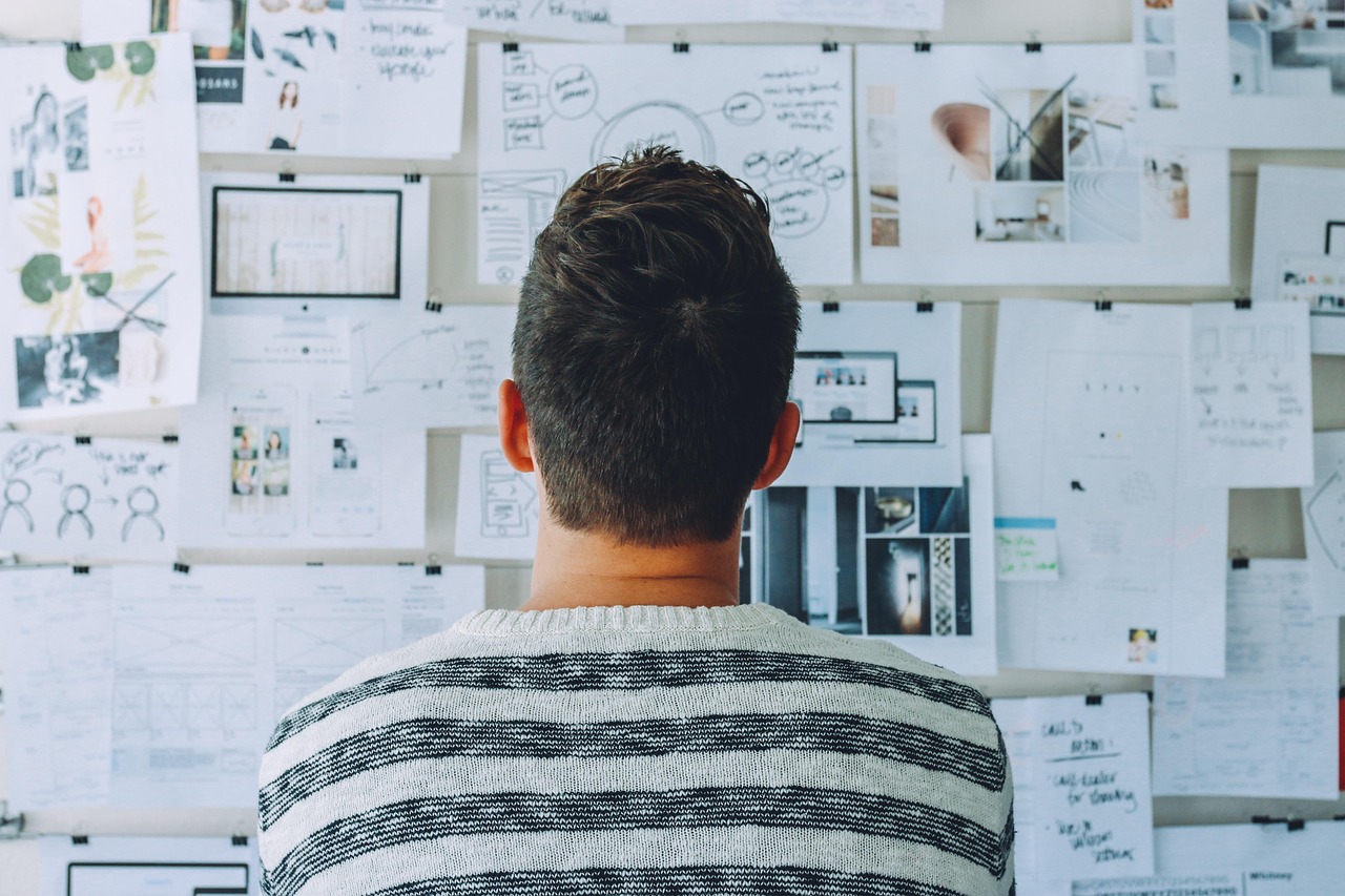 Services concept, man, papers, person, plan, planning, research, thinking, whiteboard, blue paper, blue thinking, blue research, blue plan, blue planning, blue think, plan, plan, planning, planning, research, research, research, research, research, thinking, thinking, thinking, thinking