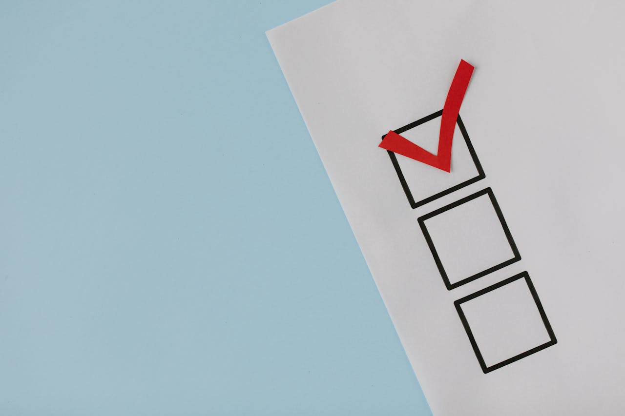 Services A simple white paper checklist with one red checkmark, ideal for concepts like completion or approval.